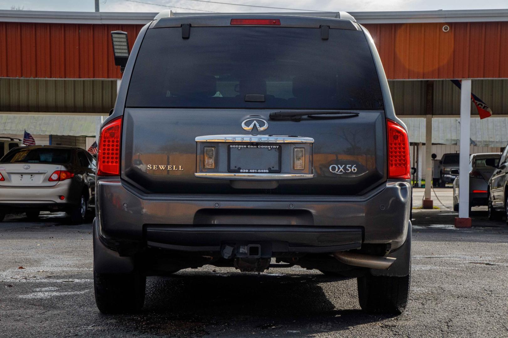 2008 BLACK INFINITI QX56 AWD (5N3AA08C48N) with an 5.6L V8 DOHC 32V engine, 5-SPEED AUTOMATIC transmission, located at 420 E. Kingsbury St., Seguin, TX, 78155, (830) 401-0495, 29.581060, -97.961647 - Photo#5